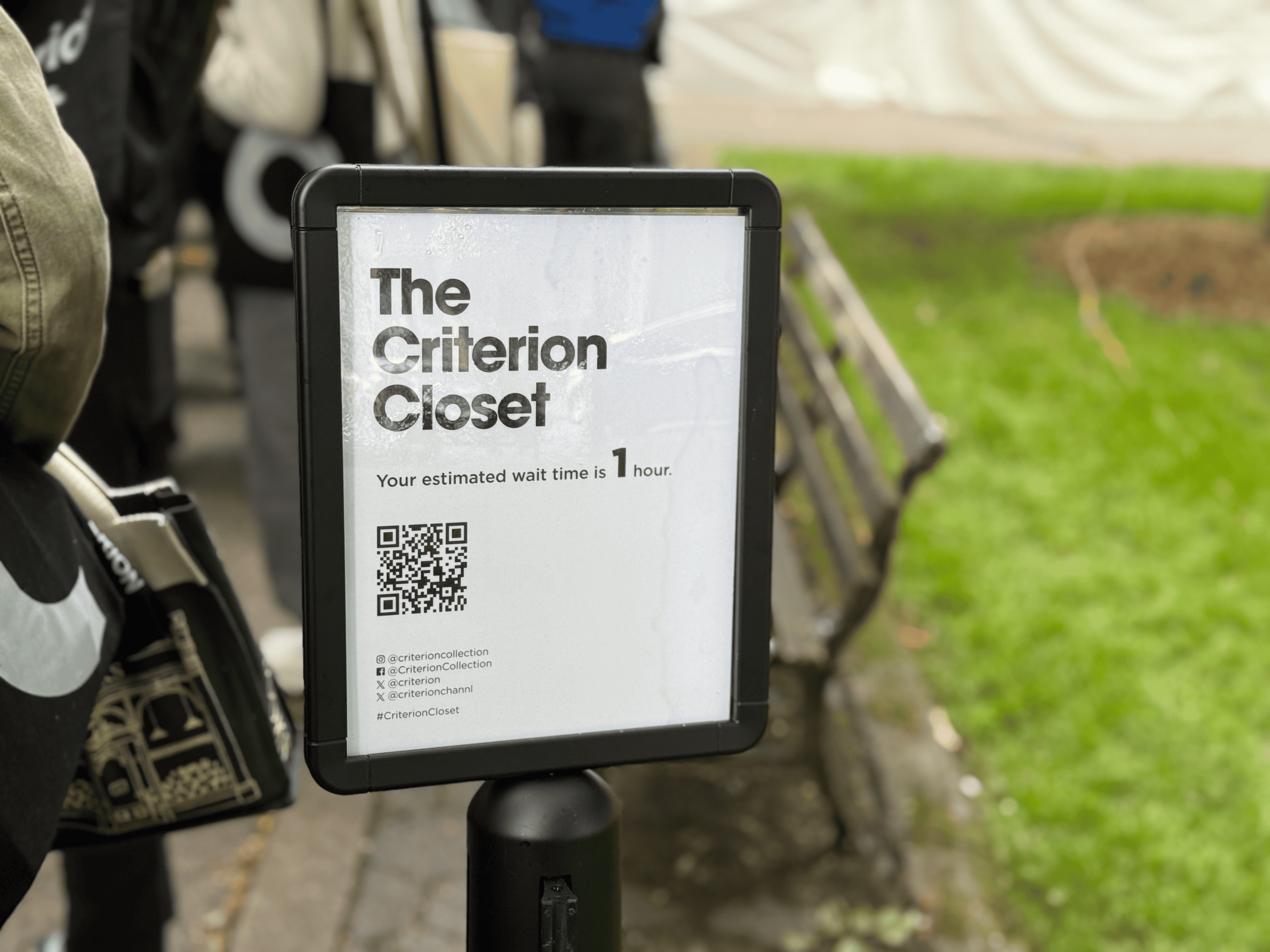 A sign reading 'The Criterion Closet: your wait time is 1 hour'